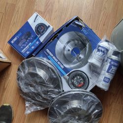 Brand New Brake And Rotor Kit  And New CV Axle