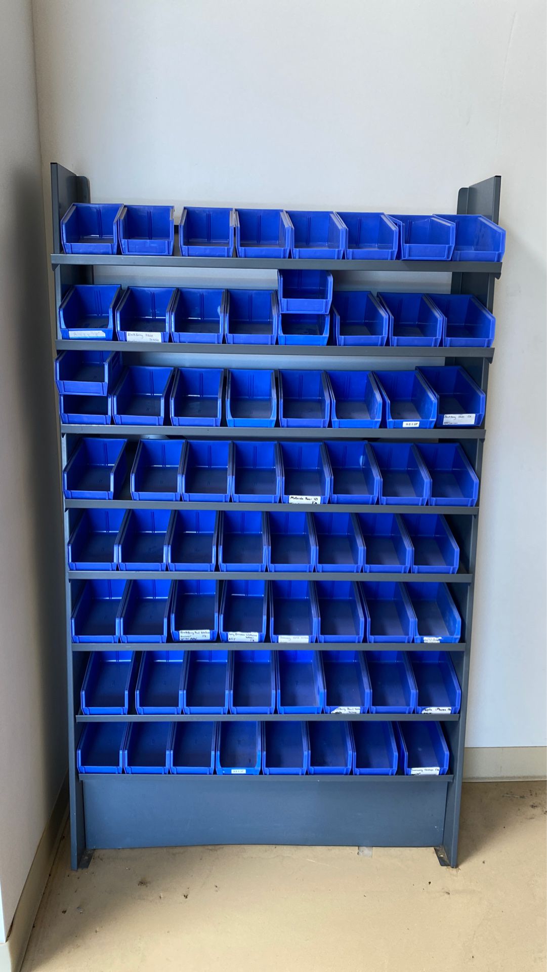 Uline bin rack with blue bins