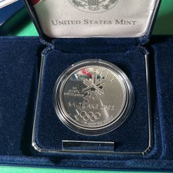 Under Melt. 2002 US Silver Dollar Coin 