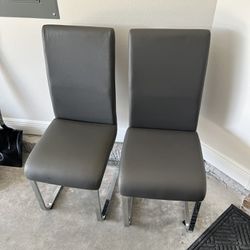 Two Gray Dining Room Chairs