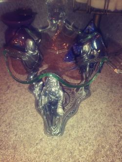 A silver Aroma burner