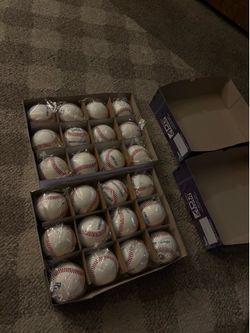 2 dozen of brand new baseballs