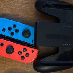 Nintendo Switch, Original Controllers, And An Extra One