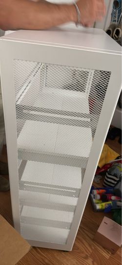 White bookshelf with wheels