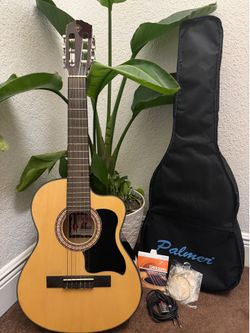 Acoustic-electric guitar.     Guitarra electroacústica