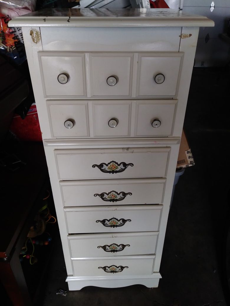 White dresser 50 inches tall x 17 1/2 inches wide for sale
