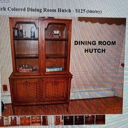 Dark color dining room hutch