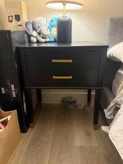 Black with gold accents night stands