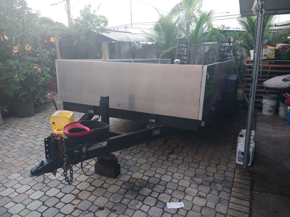flat heavy duty trailer with aluminum sides.