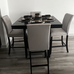 WOODEN DINING TABLE AND CHAIRS