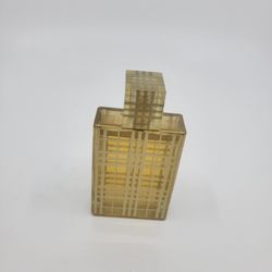 Vintage Retired Burberry Brit Gold Eau De Parfum Spray Limited Edition 
1.7 oz 90% full.
NO original box. Made in France.
Weight 6.25oz plus shipping 