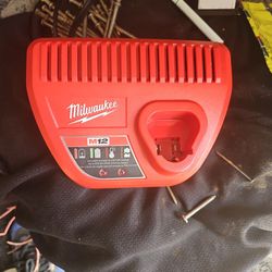 Milwaukee in 12 battery charger.
Brand new.