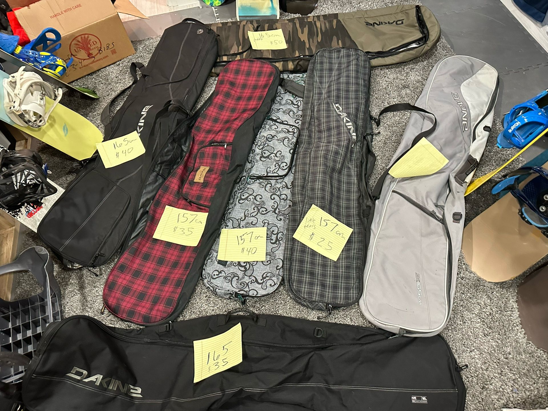 Dakine snowboard bags and snowboard boots/helmets/goggles/gloves/coats and pants