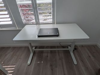 Electric adjustable height sitting/standing desk