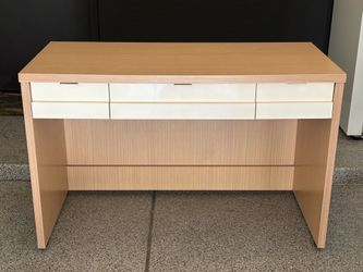 Great quality modern dual-tone wood and white writing desk. 50 x 23.5 inches