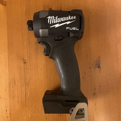 Milwaukee M18 Dyed Black 1/4 Impact                  PRICE FIRM!!