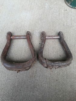 Vintage saddle stirrups good condition nice leather sticking