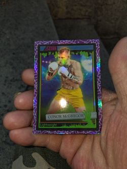 2026 Panini Score A Treat Conor McGregor Hall of Fame UFC Boxer (#191) "Holo Rainbow Webs" trading card. Near Mint/Mint Condition
