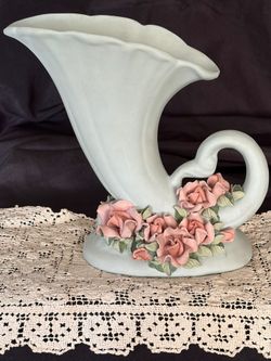 Vintage pottery cornucopia shaped vase