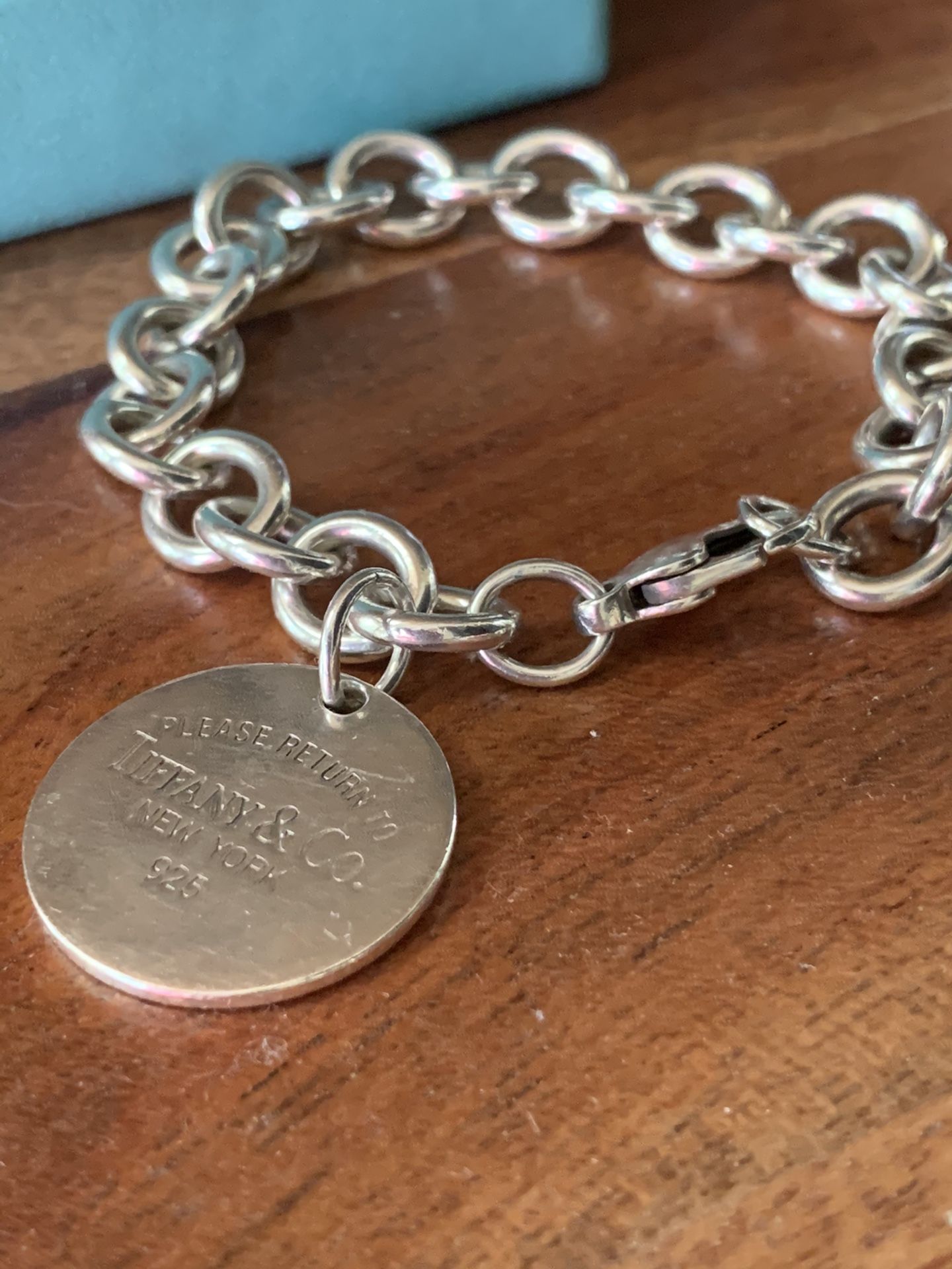 Tiffany & Co. authentic round tag bracelet return to