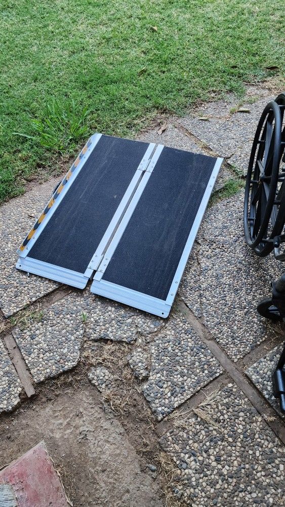 Wheelchair With Folding Ramp