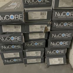 NuCore Waterproof Scratch Resistant Flooring and 2 Bathroom Faucets. 