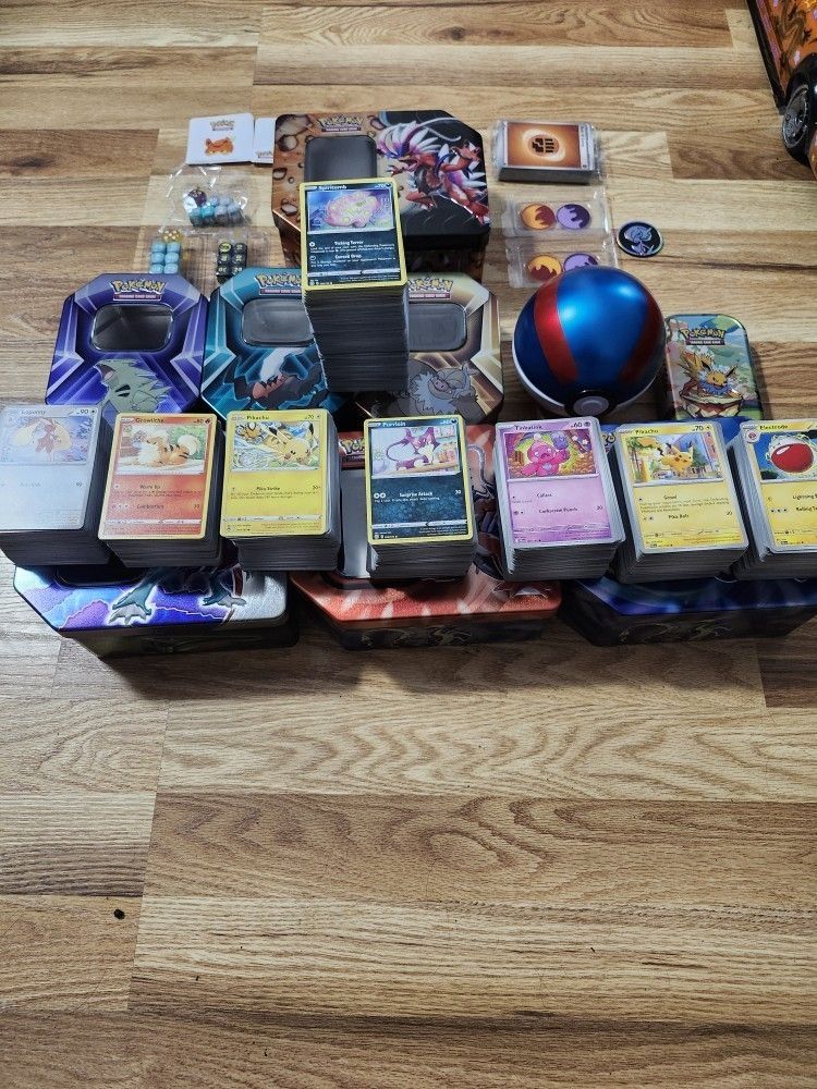 Over 1500 Pokémon Cards Lots Of Tins $50