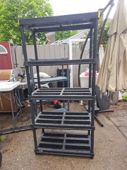 The price is firm..Large garage shelving unit..