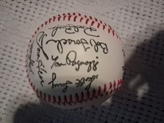 Signed Baseball By The Brave Tram