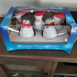 5 Penguin  driveway markers