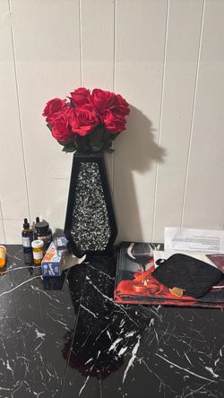 Vase and artificial flowers