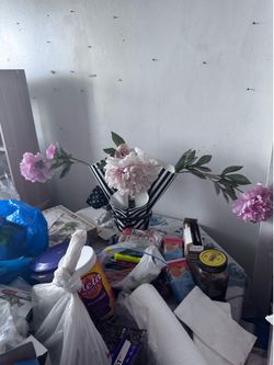 Plastic vase with flowers