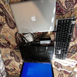 MacBook Pro 2012, Toshiba laptop, keyboard and chargers for both Mac and windows