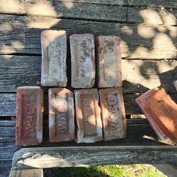 Antique bricks and petrified wood ann rocks