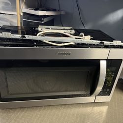 Whirlpool stainless Steel Black Over The Range Microwave/Vent  - $150