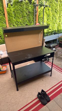 Workbench with pegboard and power outlets