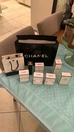 Collection of used Chanel perfume bottles
