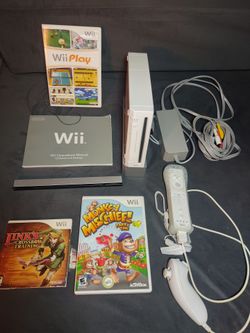 Nintendo Wii console and 13 games selling everything pictured $135 or best offer
