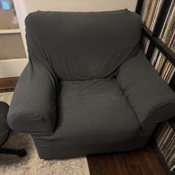 Large Comfy Blue Leather Chair With Gray Slip Cover 