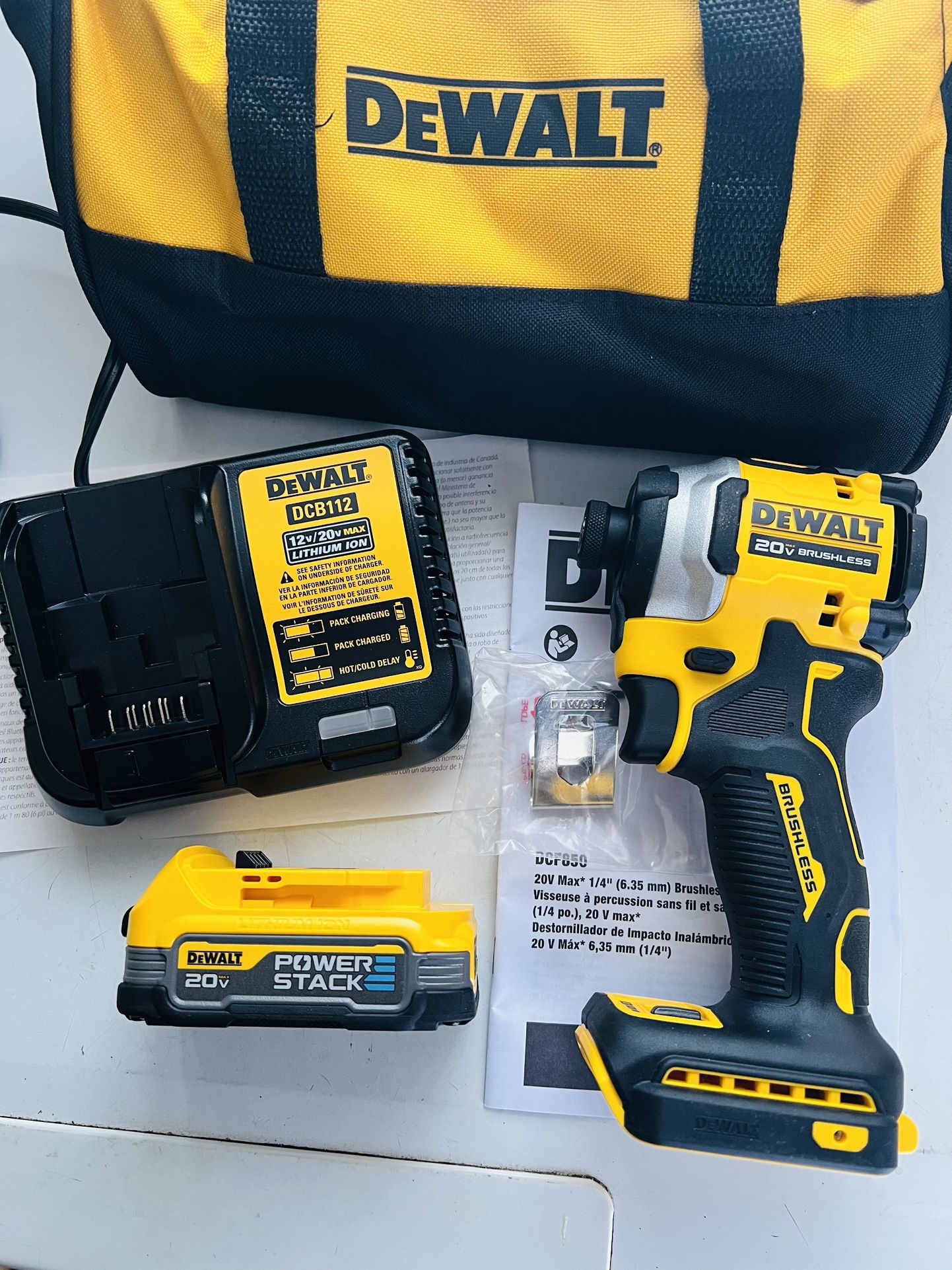 New Dewalt ATOMIC 20V MAX Impact Driver Kit (1) POWERSTACK Battery (1) Charger & Tool Bag. $160