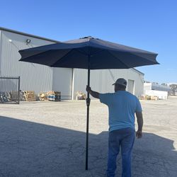 Brand New 9 Ft Patio Umbrella (gray )