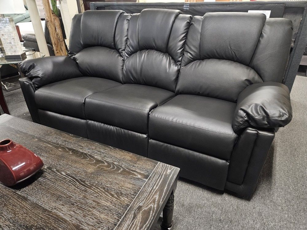Brand New Black Bonded Leather Manual Reclining Sofa