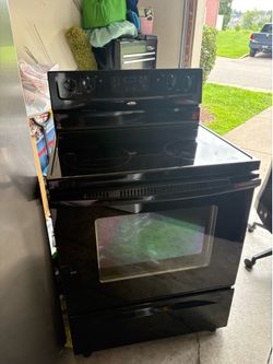 Whirlpool black range top glass stove