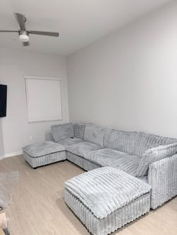 Brand new grey sectional couch