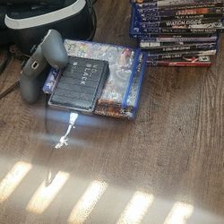 Ps4 W/2 Controllers Vr Headset & 2tb Drive And Ton Games