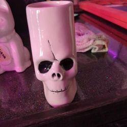 Tall skellington tiki mugs