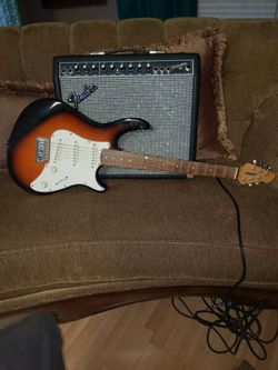 Fender Amp And Peavey Electric Guitar 