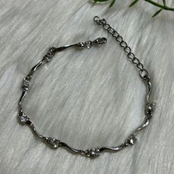Faceted rhinestones silver tone bracelet