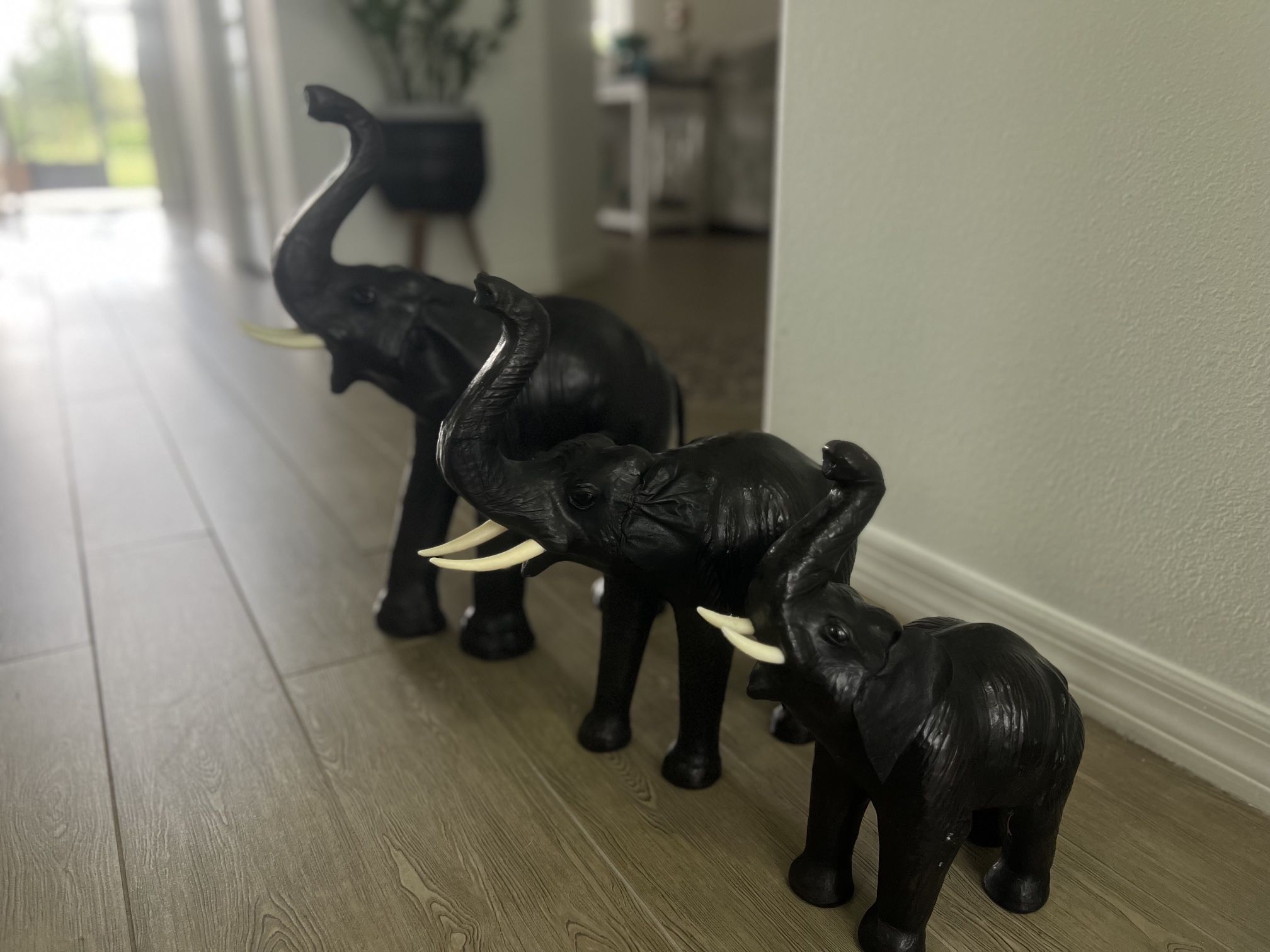 set of handmade leather elephant figures
