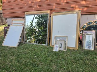 Round and square wall mirrors, a lot of different size framed wall art,